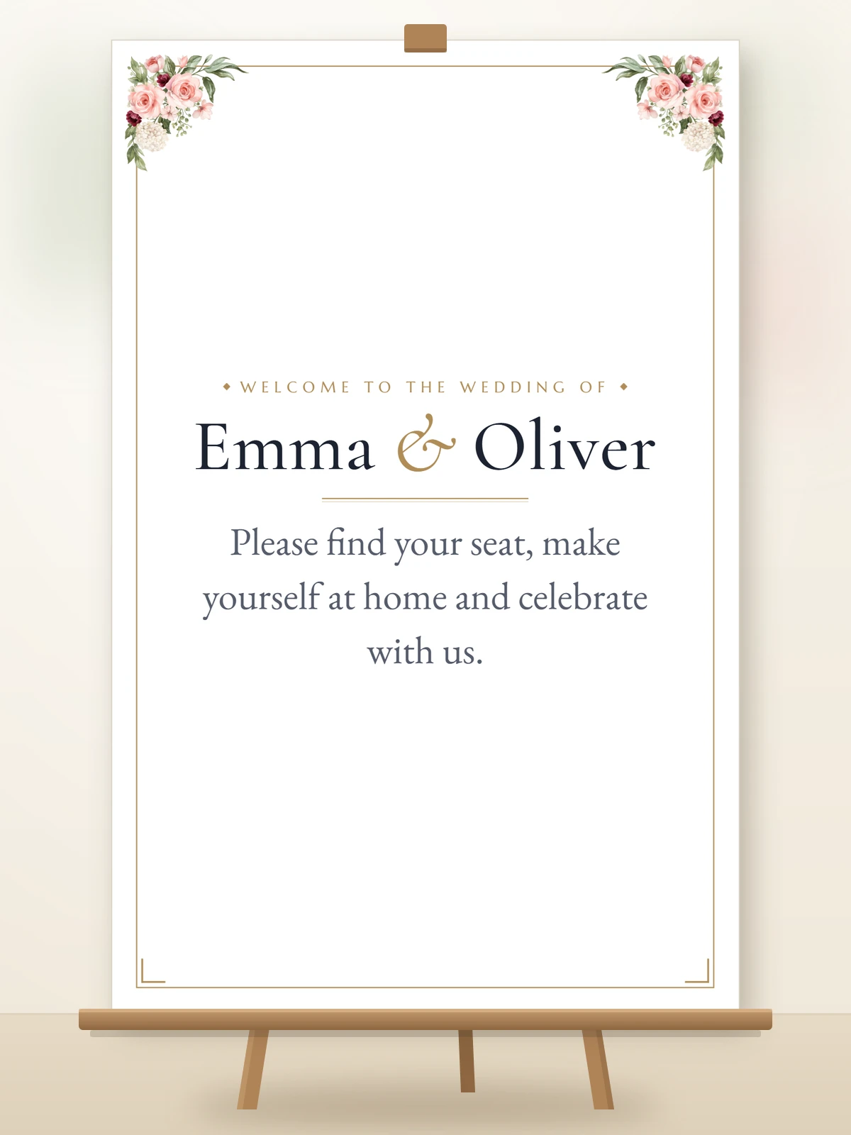 Wedding welcome sign on a wooden easel: Welcome to the wedding of Emma and Oliver