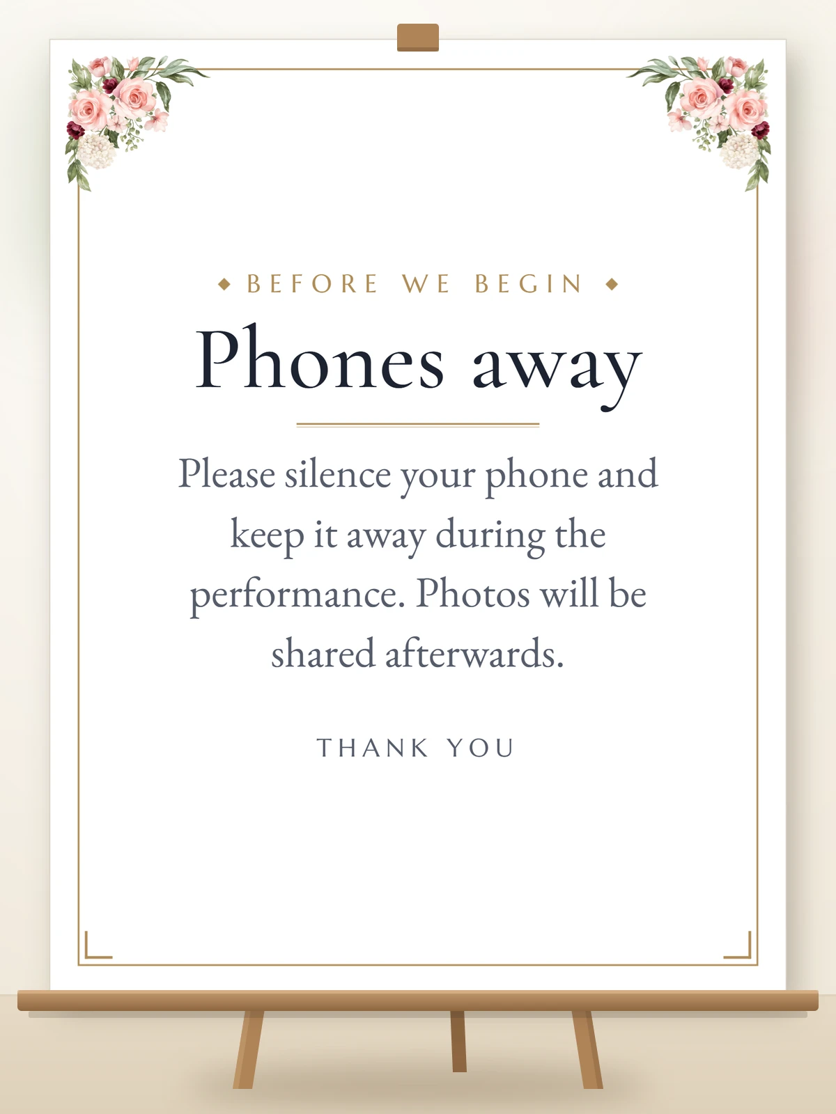Phones away sign for a recital on a wooden easel